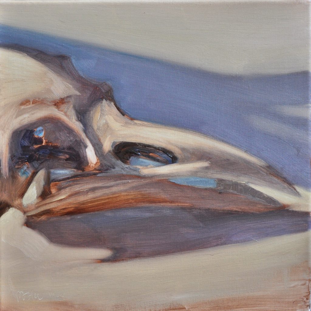 A painting titled "Perfection: Existence Construction within the Brush Jar Shadow." It shows a raven skull bathed in bright, warm light, contrasted by deep, vibrant blue shadows. The shadows, cast by a jar of brushes, wrap around the bone's ivory surface. The construction of the skull is both delicate and solid, emerging from the cool, dark tones of the studio's atmosphere.